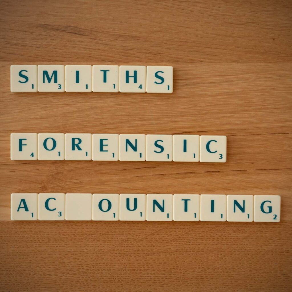 Scrabble tiles spelling out Smiths Forensic Accounting